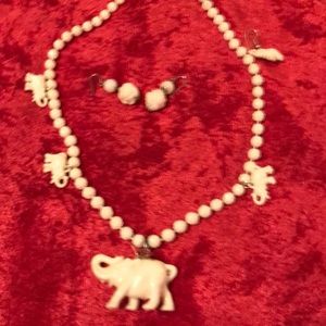 Vintage elephant set.  Ivory, pierced earrings.
